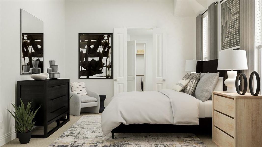 Bedroom featuring light colored carpet