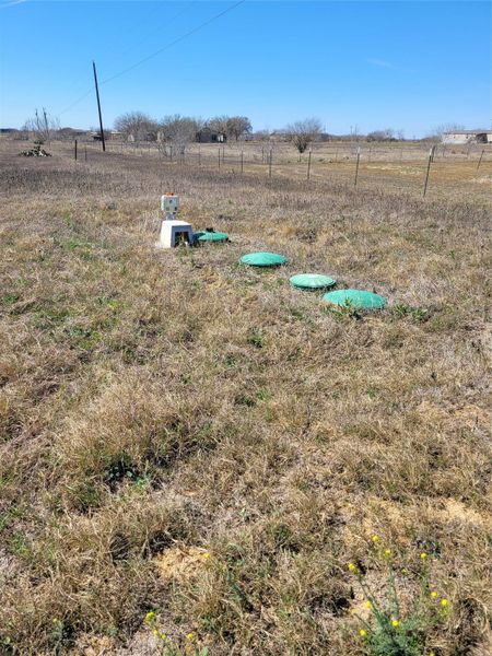 A verdant rural lot offers ample space for new construction, surrounded by open fields. A verdant rural lot offers ample space for new construction, surrounded by open fields.