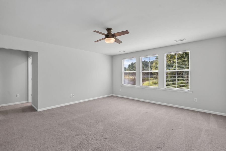 Spacious, unfurnished interior of a new home in Sweetgrass at Summers Corner, Summerville (Image 49).
