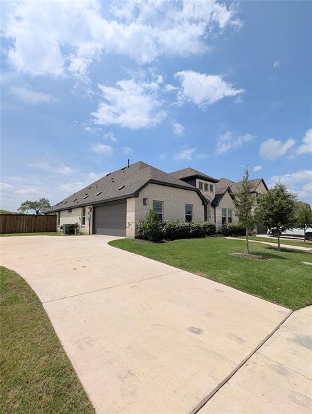 Front exterior of a new home in Westside Preserve Classic, Midlothian, TX, highlighting curb appeal (Image 1). Front exterior of a new home in Westside Preserve Classic, Midlothian, TX, highlighting curb appeal (Image 1).