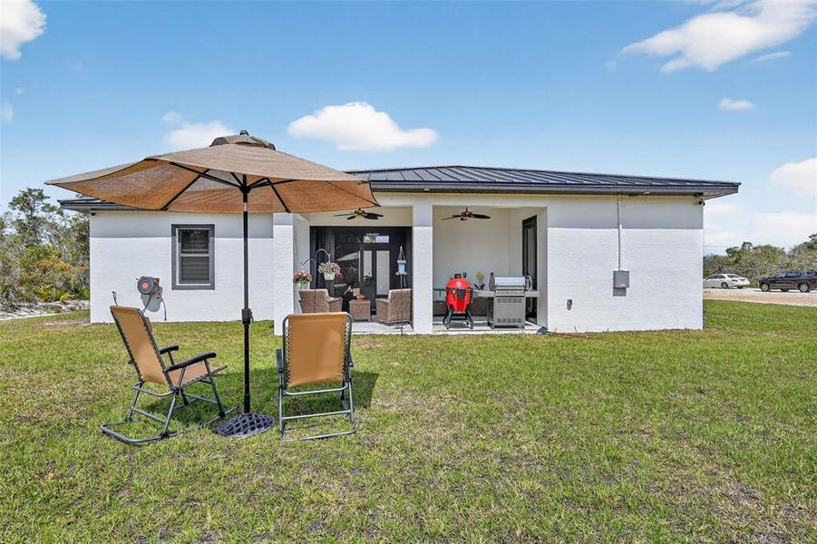 Exterior details and patio area of a home in , Lake Placid (Image 22).