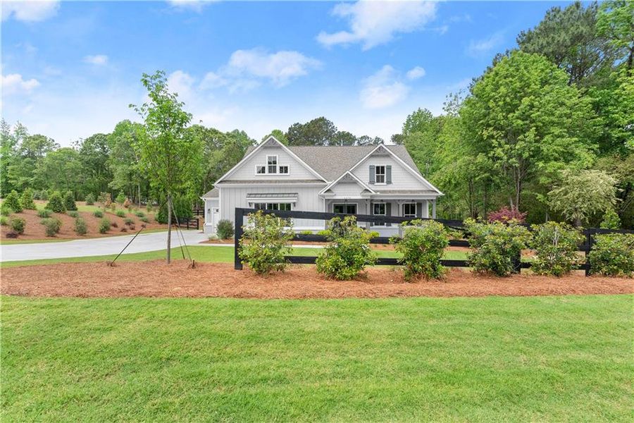 Front exterior of a new home in , Gainesville, GA, highlighting curb appeal (Image 37).