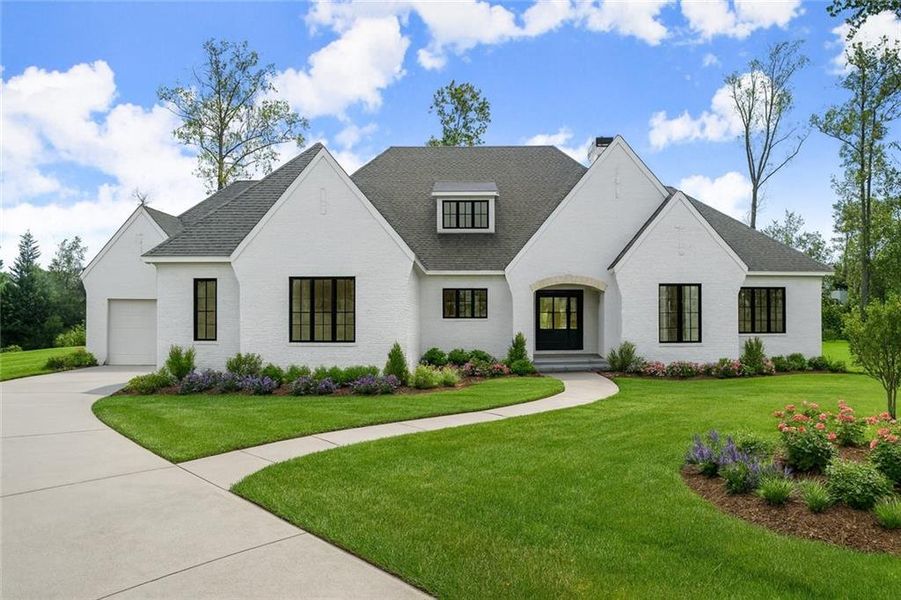 Front exterior of a new home in , Alpharetta, GA, highlighting curb appeal (Image 11).