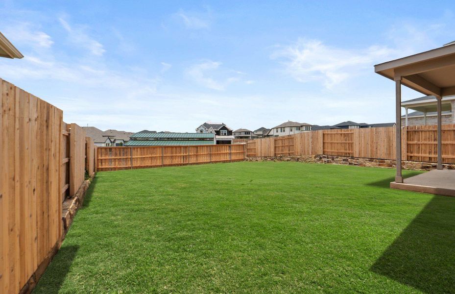 Exterior details and patio area of a home in Sunfield, Buda (Image 2). Exterior details and patio area of a home in Sunfield, Buda (Image 2).