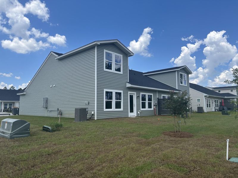 Exterior details and patio area of a home in Hammock Walk at Nexton, Summerville (Image 4).