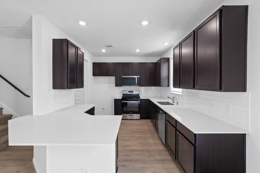 Furnished interior view inside a new home in Grace Landing, Willis (Image 5).