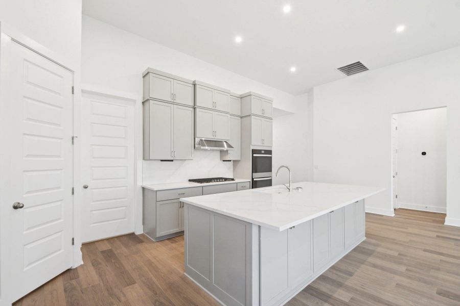Furnished interior view inside a new home in Persimmon, Buda (Image 8).