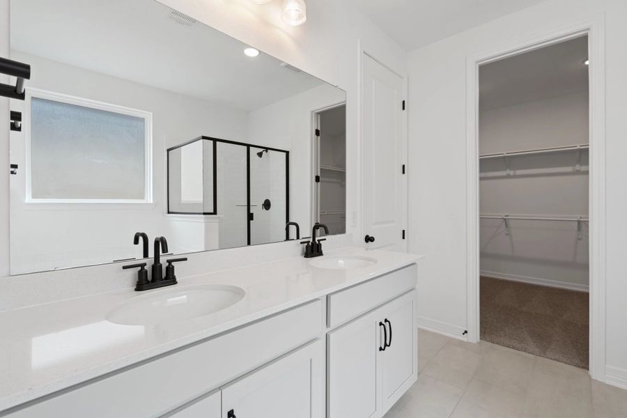 Primary bath. Note: Sample product photo. Actual exterior and interior selections may vary by homesite. Photo may be virtually staged