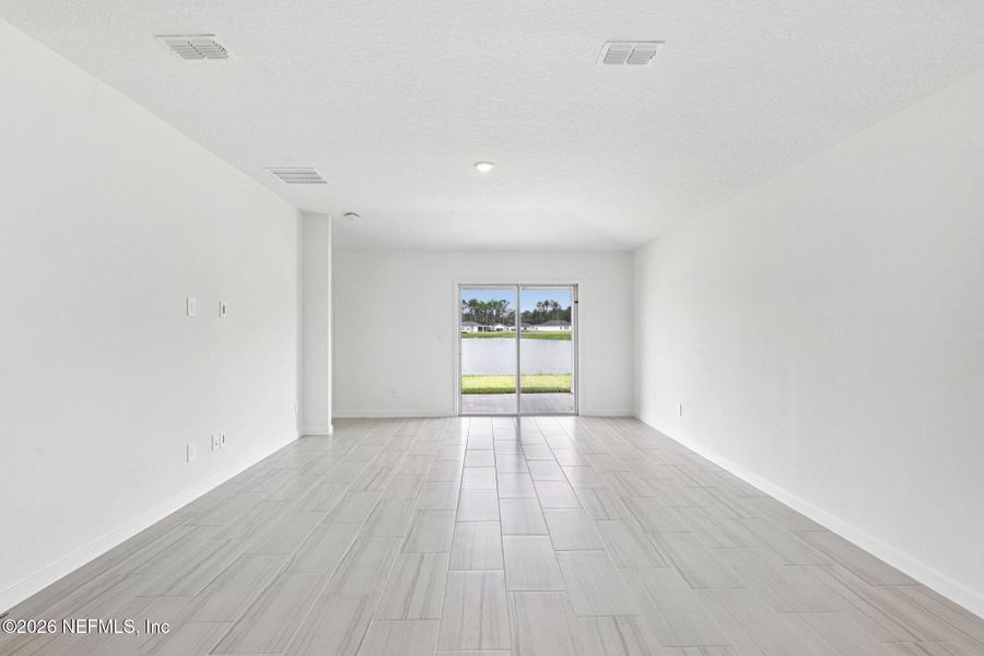 Spacious, unfurnished interior of a new home in Colbert Landings, Palm Coast (Image 12).