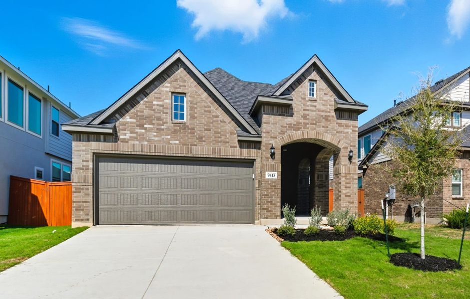 Front exterior of a new home in Stillwater Ranch, San Antonio, TX, highlighting curb appeal (Image 21). Front exterior of a new home in Stillwater Ranch, San Antonio, TX, highlighting curb appeal (Image 21).