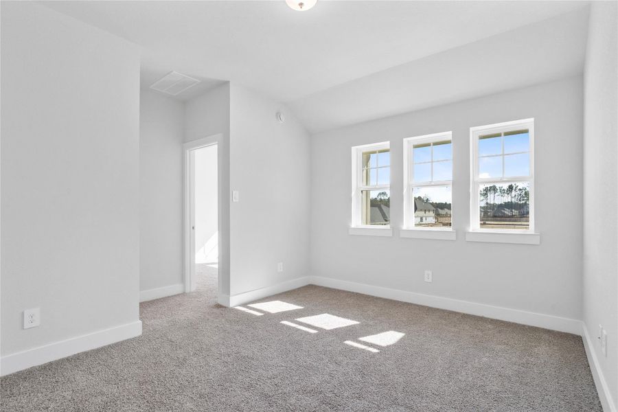 Ascend to this versatile second-floor loft, a bright and inviting space defined by its expansive feel and abundant natural light. This open loft area offers endless possibilities—envision a cozy media room, a productive home office, a vibrant play area, or a quiet reading nook—adapting easily to the buyer's needs.