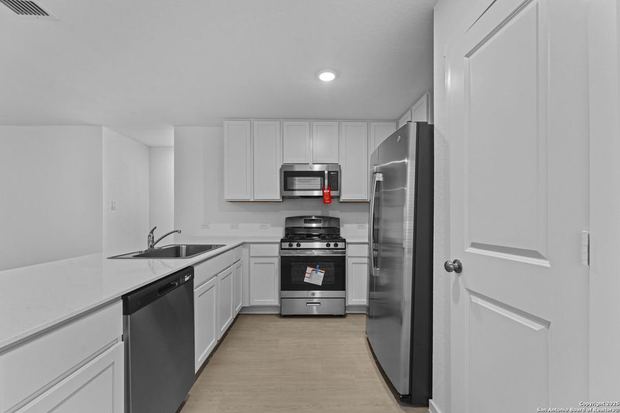 Furnished interior view inside a new home in Torian Village: Belmar Collection, San Antonio (Image 4).