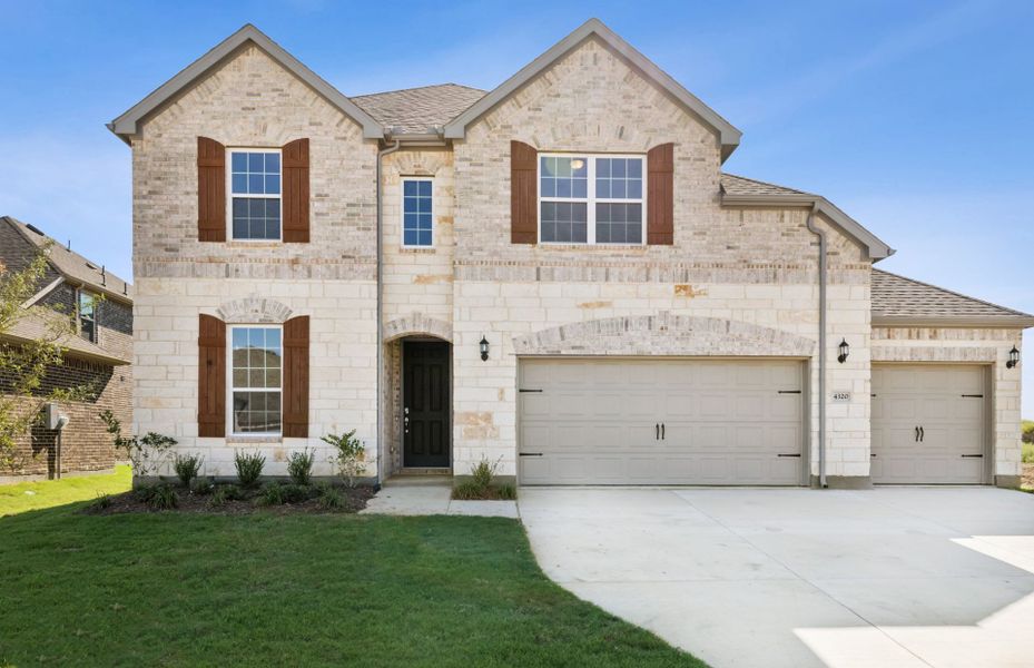 The Lexington, a two-story home with 3-car garage