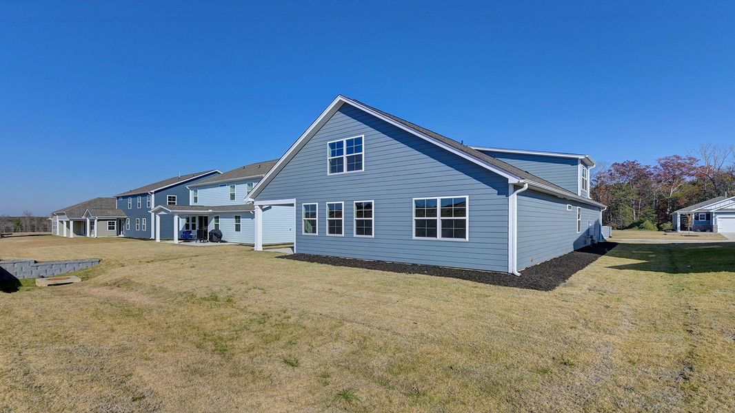 Exterior details and patio area of a home in Livingston Woods, Irmo (Image 25).