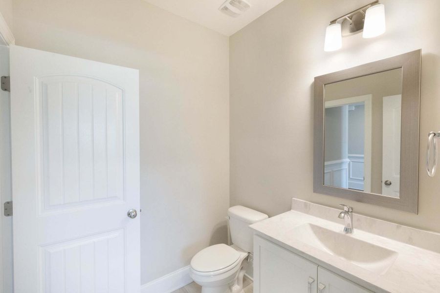 Representative furnished interior of a home built from the Austin by Caviness & Cates Communities in Bartlett Manor, Youngsville (Image 94).