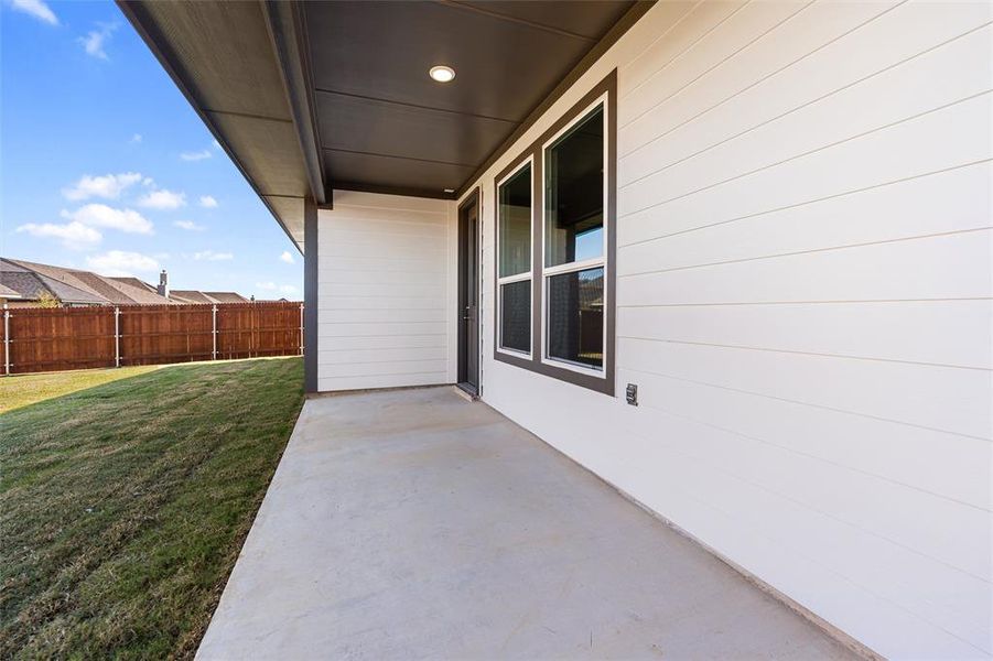 Exterior details and patio area of a home in Covenant Park, Springtown (Image 19). Exterior details and patio area of a home in Covenant Park, Springtown (Image 19).