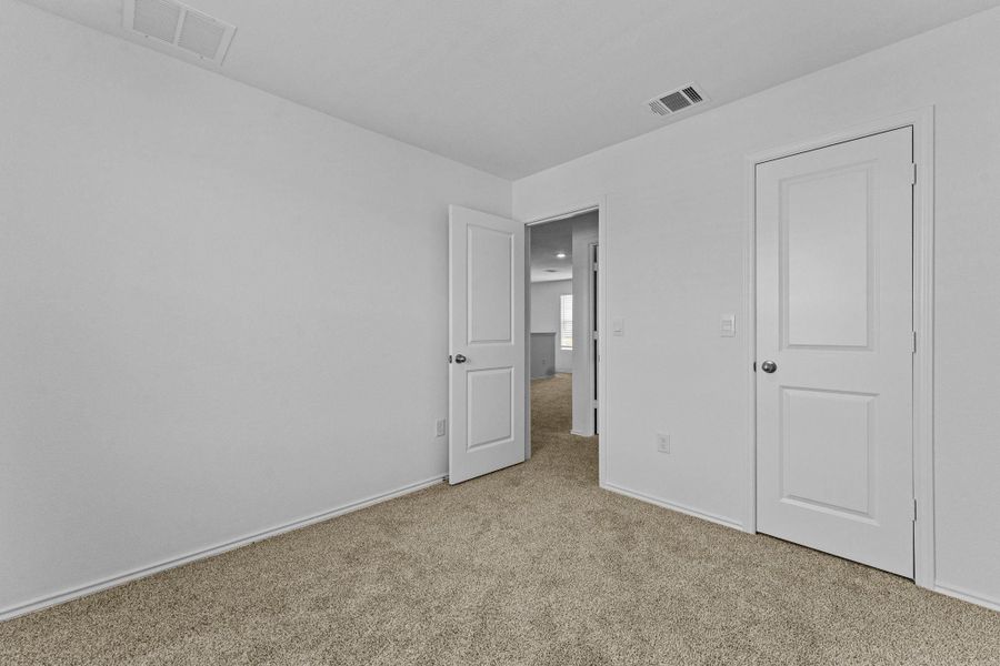 Spacious, unfurnished interior of a new home in Prairie Lakes, Buda (Image 34).