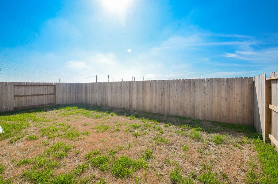This expansive backyard is fully fenced, perfect for privacy. This expansive backyard is fully fenced, perfect for privacy.