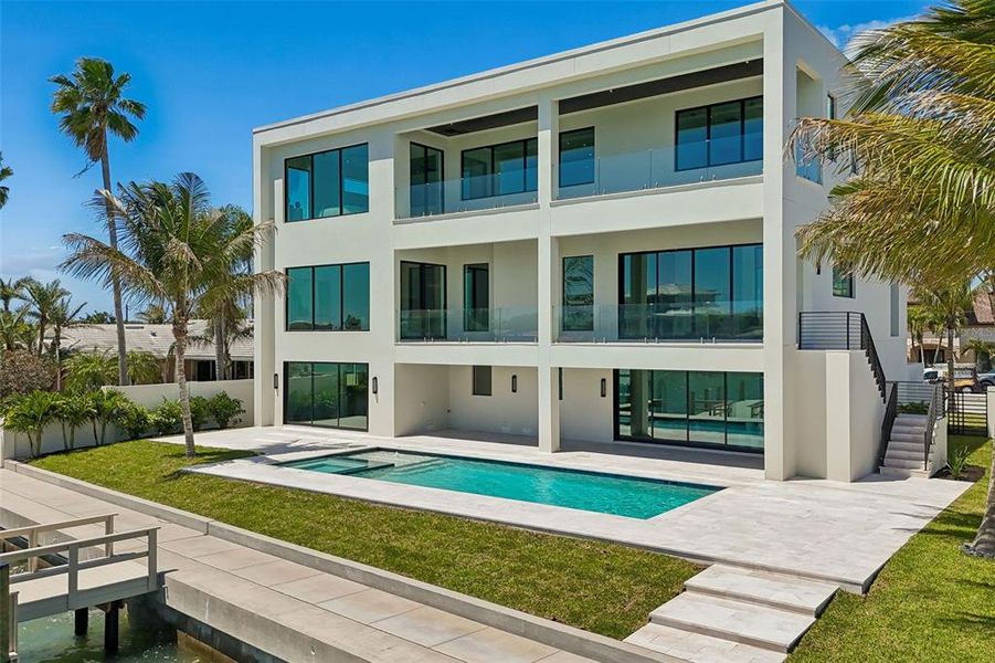 Exterior details and patio area of a home in , Belleair Beach (Image 42).