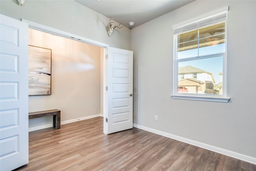 Dedicated office with built custom built ins.