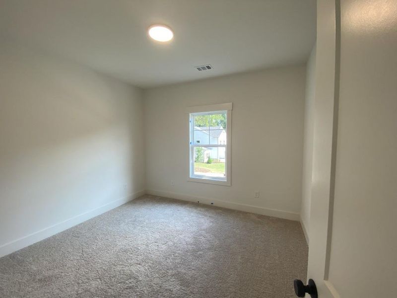 Spacious, unfurnished interior of a new home in Hillshire, Cumming (Image 24).