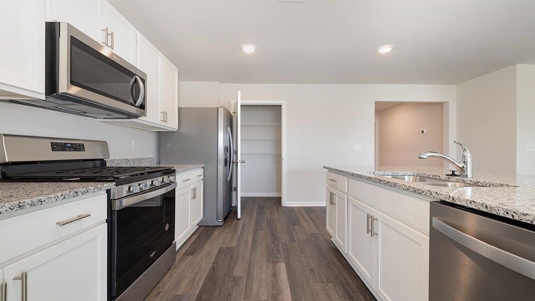 Representative furnished interior of a home built from the ARIA by D.R. Horton in Ridgefield, Conway (Image 9).