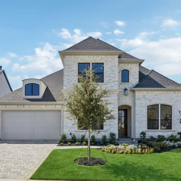 Front exterior of a new home in StarView, Prosper, TX, highlighting curb appeal (Image 25).
