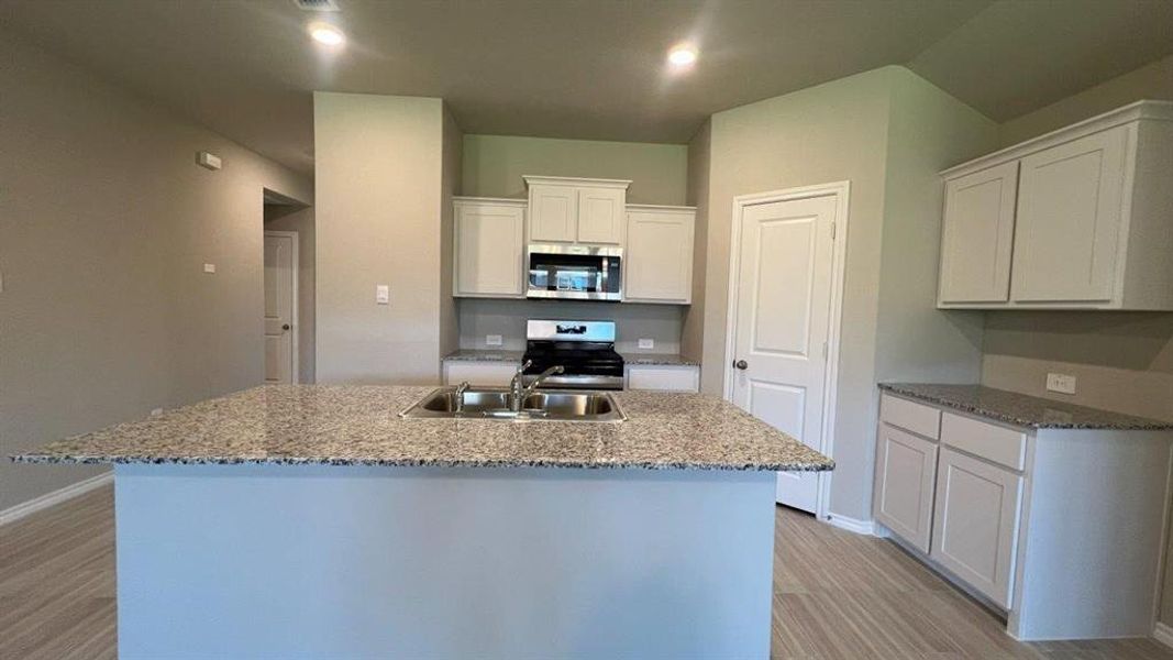 Furnished interior view inside a new home in Rosewood at Beltmill, Fort Worth (Image 8).