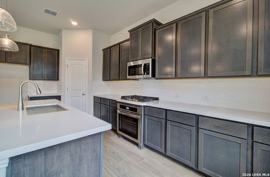 Furnished interior view inside a new home in Stream Waters, Seguin (Image 6).