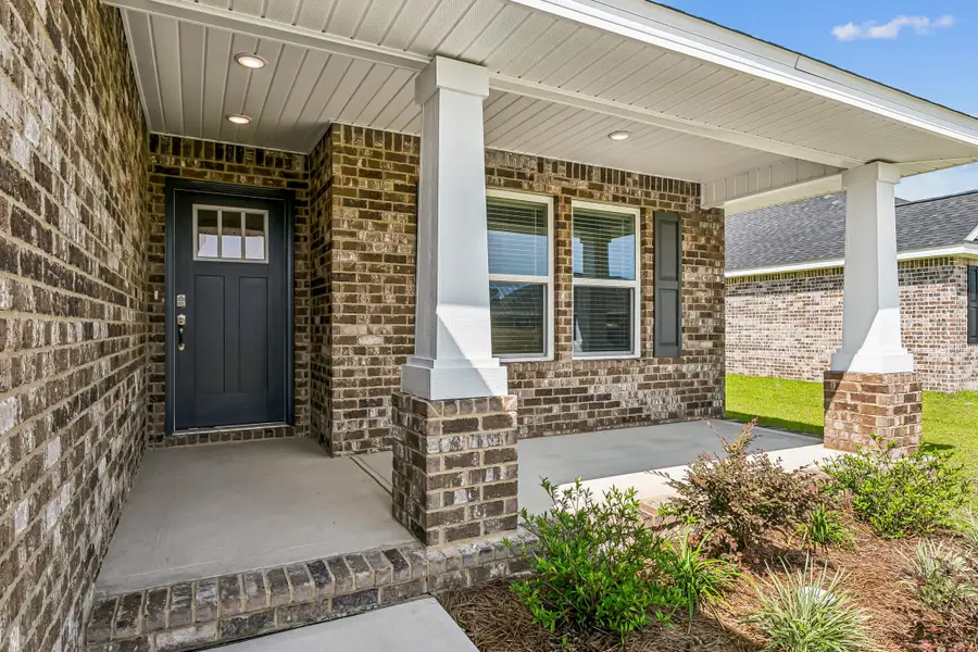 Representative exterior details of a home built from the The Carlos by Herbst Homes in Buckeyes Landing, Navarre (Image 56). Representative exterior details of a home built from the The Carlos by Herbst Homes in Buckeyes Landing, Navarre (Image 56).