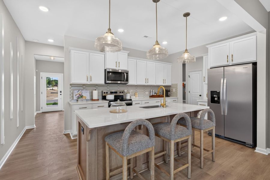 Furnished interior view inside a new home in The Ridge Townhomes, Monroe (Image 5).