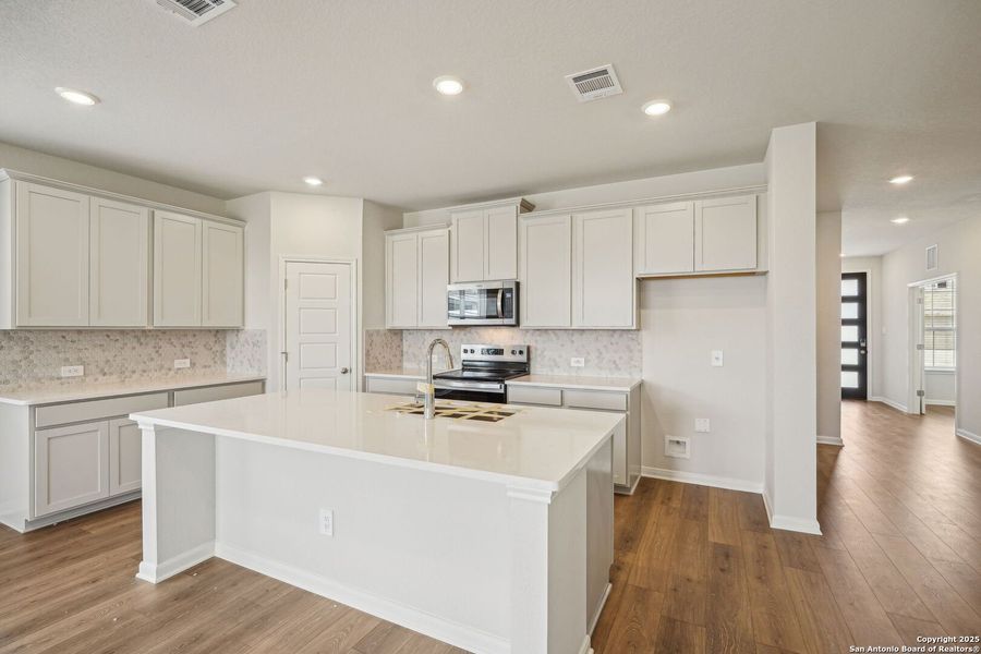 Furnished interior view inside a new home in Sagebrooke - Premier Series, San Antonio (Image 11). Furnished interior view inside a new home in Sagebrooke - Premier Series, San Antonio (Image 11).