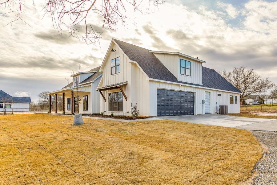 Representative exterior photo of a completed home built from the Erin by Trinity Classic Homes in The Reserve at Shadle, Poolville, TX (Image 21). Representative exterior photo of a completed home built from the Erin by Trinity Classic Homes in The Reserve at Shadle, Poolville, TX (Image 21).