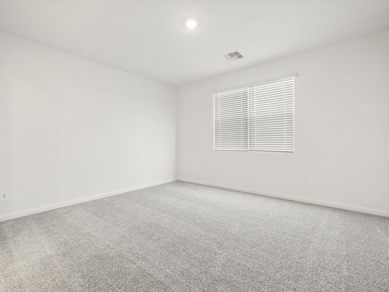 Spacious, unfurnished interior of a new home in Blossom Rock Reserve Series, Apache Junction (Image 9).