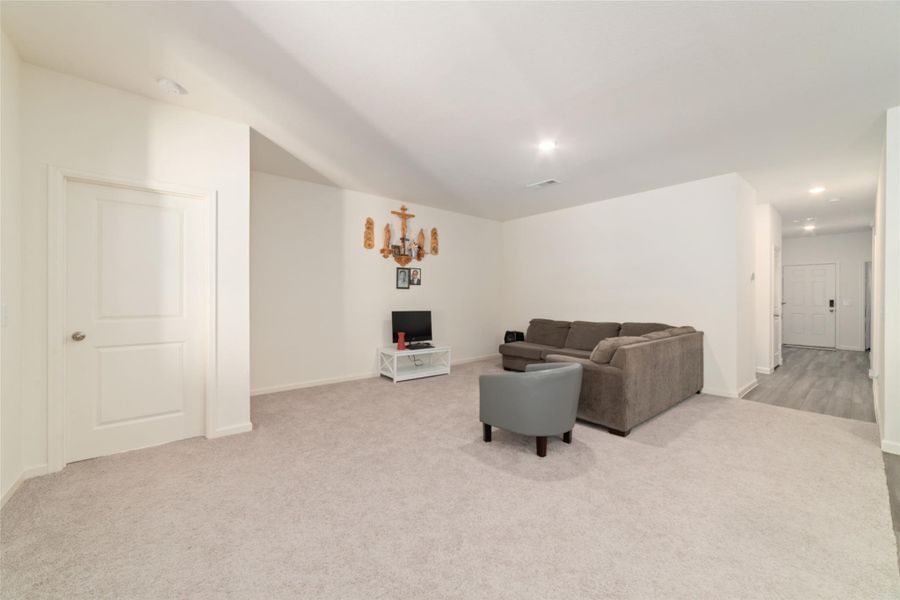 Furnished interior view inside a new home in Sunterra, Katy (Image 7).