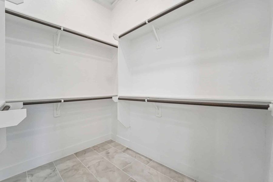 Representative unfurnished interior of a home built from the Lauren by Chesmar Homes in University Heights, Round Rock (Image 16).