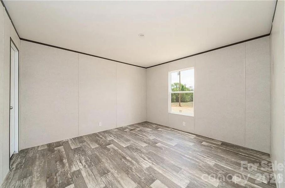 Spacious, unfurnished interior of a new home in , Lenoir (Image 17).