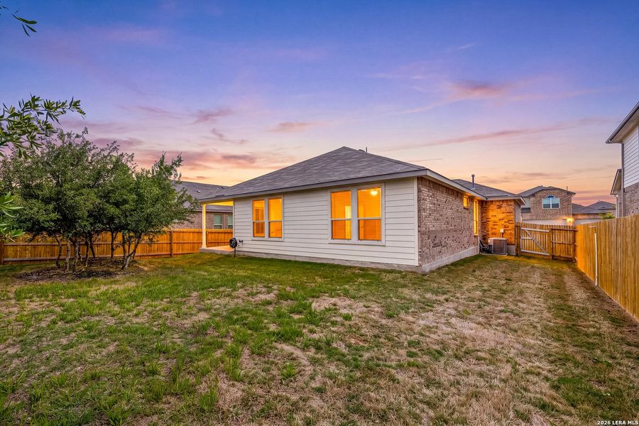 Exterior details and patio area of a home in Riverstone at Westpointe, San Antonio (Image 29).