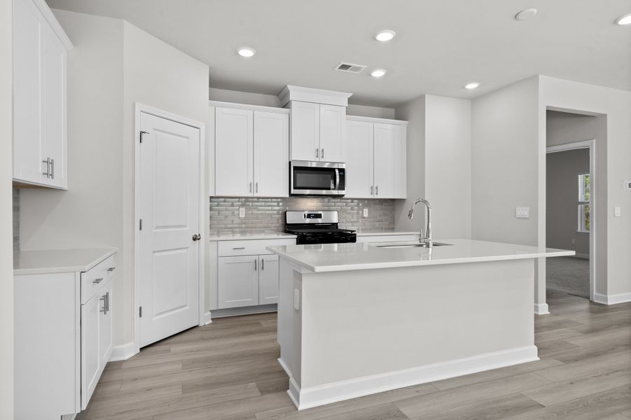 Furnished interior view inside a new home in Waterside - Boardwalk Series, Longs (Image 3). Furnished interior view inside a new home in Waterside - Boardwalk Series, Longs (Image 3).