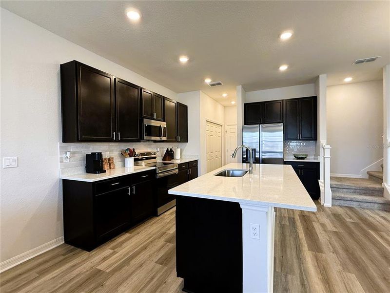Furnished interior view inside a new home in , St. Cloud (Image 15).