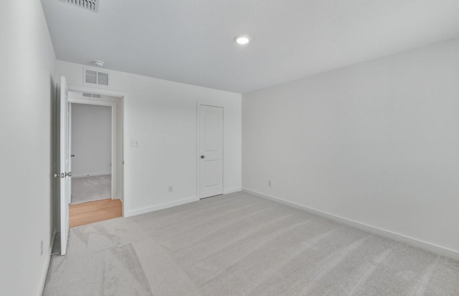 Spacious, unfurnished interior of a new home in Sunfield, Buda (Image 36). Spacious, unfurnished interior of a new home in Sunfield, Buda (Image 36).