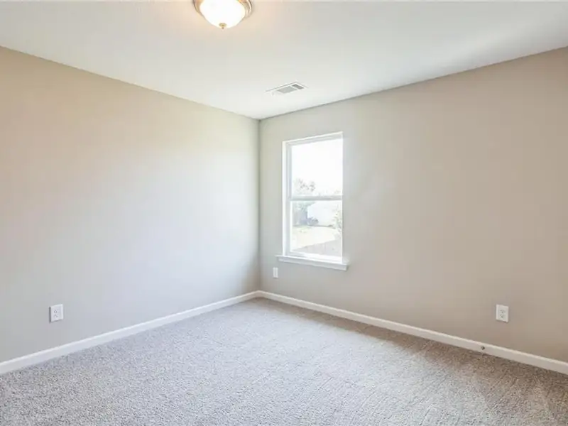 Spacious, unfurnished interior of a new home in Ivy Glen, Perry (Image 10).