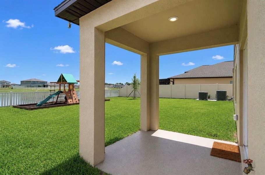 Exterior details and patio area of a home in , Parrish (Image 4). Exterior details and patio area of a home in , Parrish (Image 4).