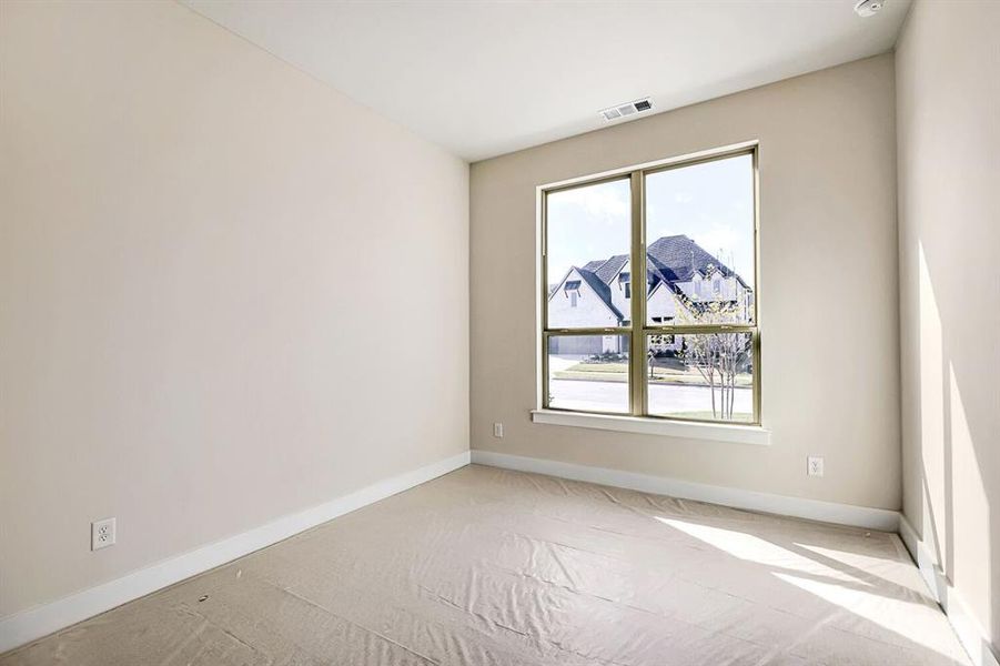 Spare room featuring baseboards Spare room featuring baseboards