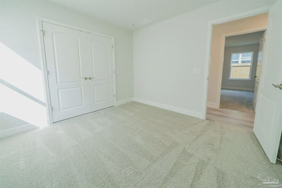 Representative unfurnished interior of a home built from the Plan 1645 by Adams Homes in Westpointe Place, Pensacola (Image 13).