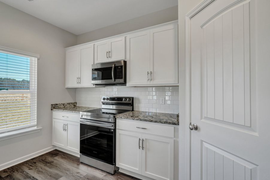 Representative furnished interior of a home built from the The Cypress by Smith Family Homes in Heritage at New Riverside, Bluffton (Image 9).