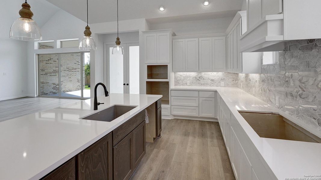 Furnished interior view inside a new home in Kallison Ranch 60', San Antonio (Image 4).