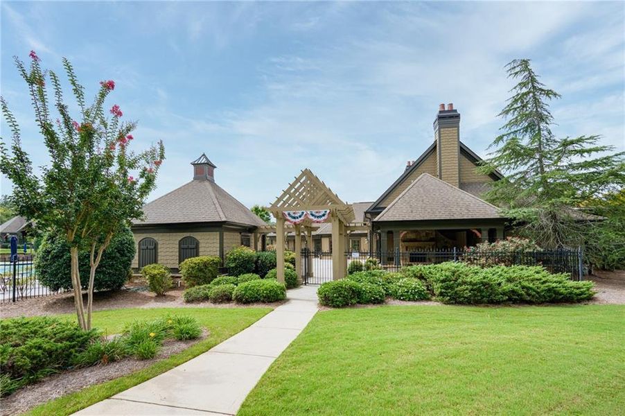 Front exterior of a new home in Sierra Creek, Hoschton, GA, highlighting curb appeal (Image 21). Front exterior of a new home in Sierra Creek, Hoschton, GA, highlighting curb appeal (Image 21).