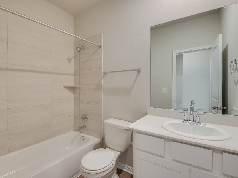 Furnished interior view inside a new home in Turner's Crossing - Reserve Collection, Buda (Image 5).