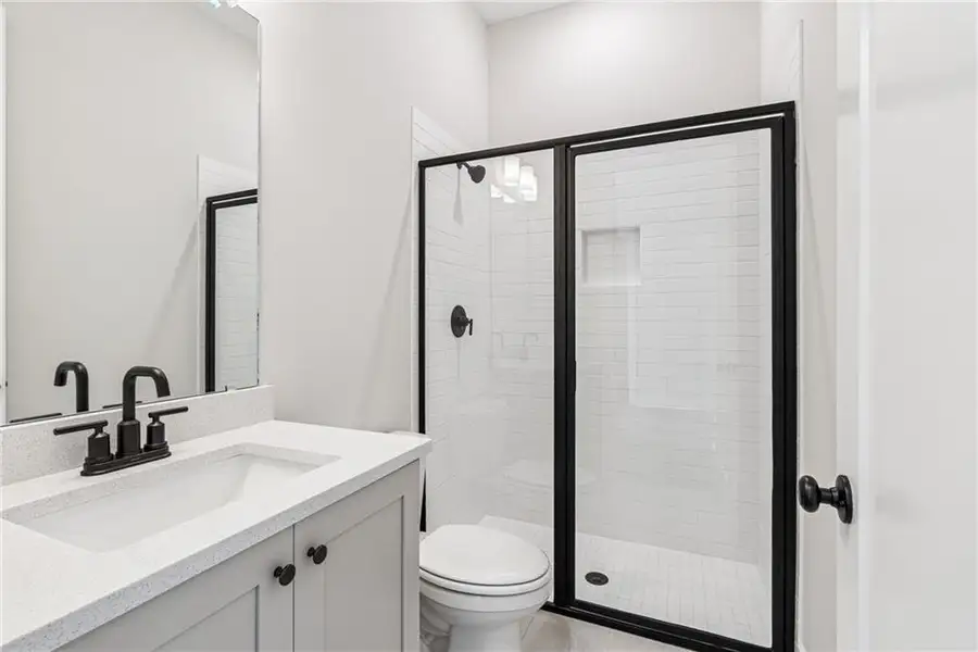 Furnished interior view inside a new home in Settingdown Farms, Cumming (Image 10).